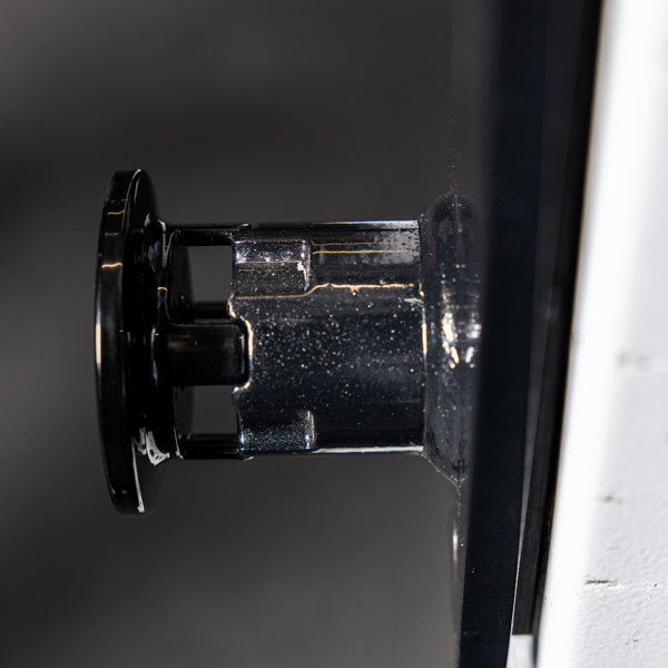 Close-up shot of the side of the pop pin on the REP Fitness Flip-Down Safeties 2.0