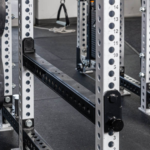Close-up shot of the REP Fitness Flip-Down Safeties 2.0 installed on a PR-5000 rack