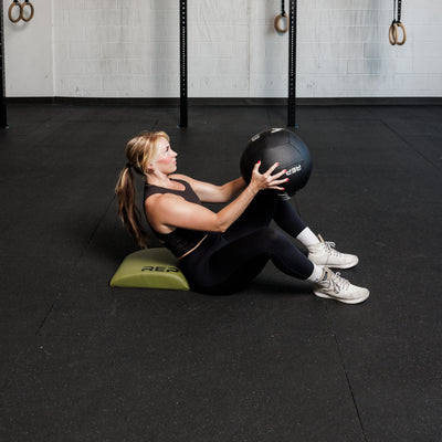 Athlete using the REP Fitness Ab Support Mat 2.0