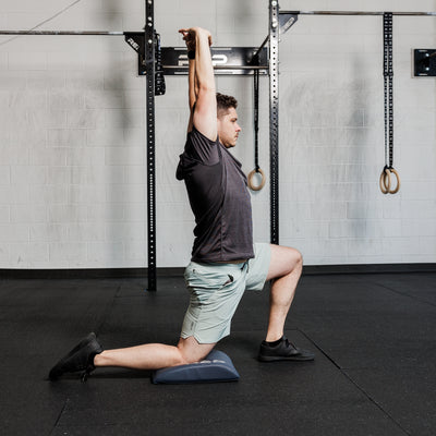 Athlete using the REP Fitness Ab Support Mat 2.0