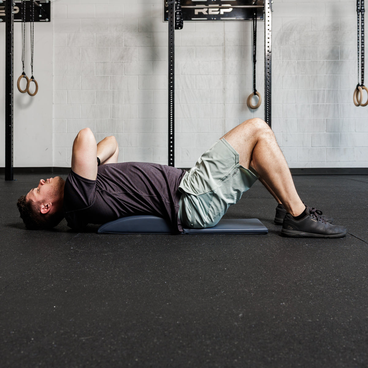 Athlete using the REP Fitness Ab Support Mat 2.0