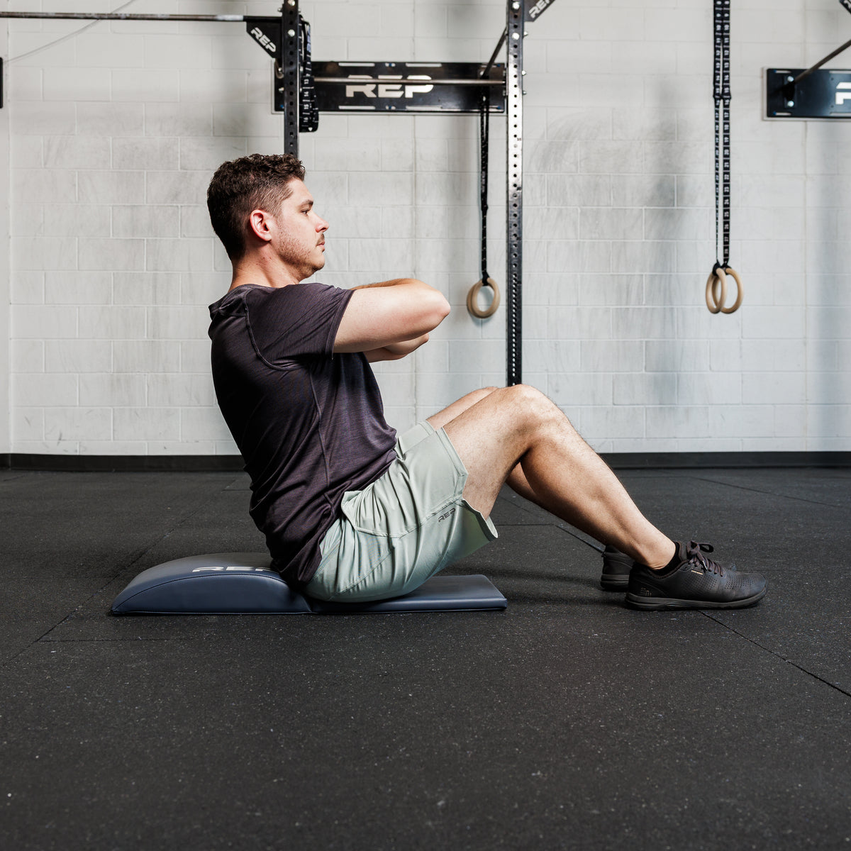 Athlete using the REP Fitness Ab Support Mat 2.0