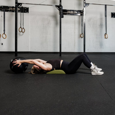 Athlete using the REP Fitness Ab Support Mat 2.0