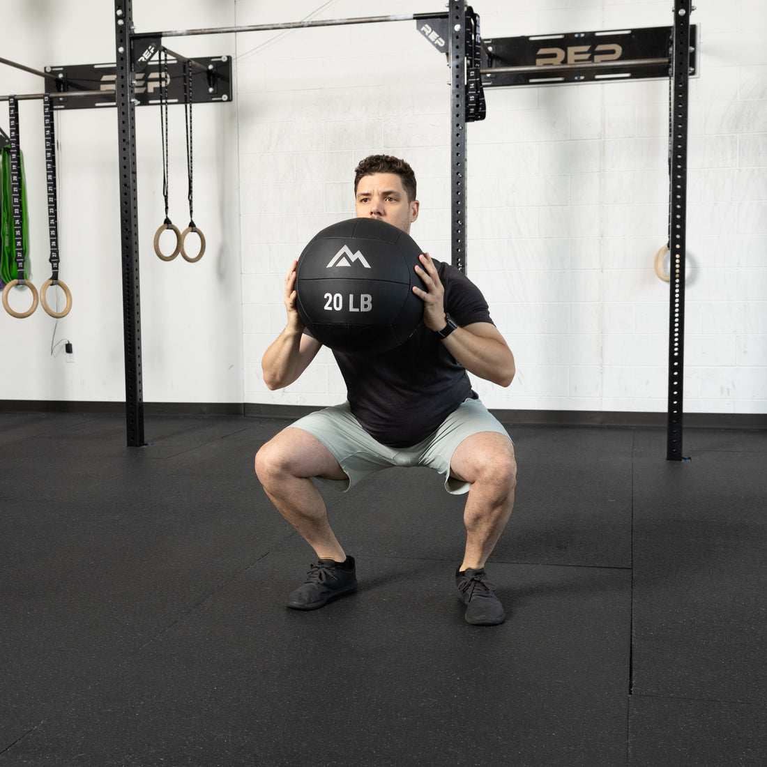 Athlete using the REP Fitness Medicine Balls 2.0