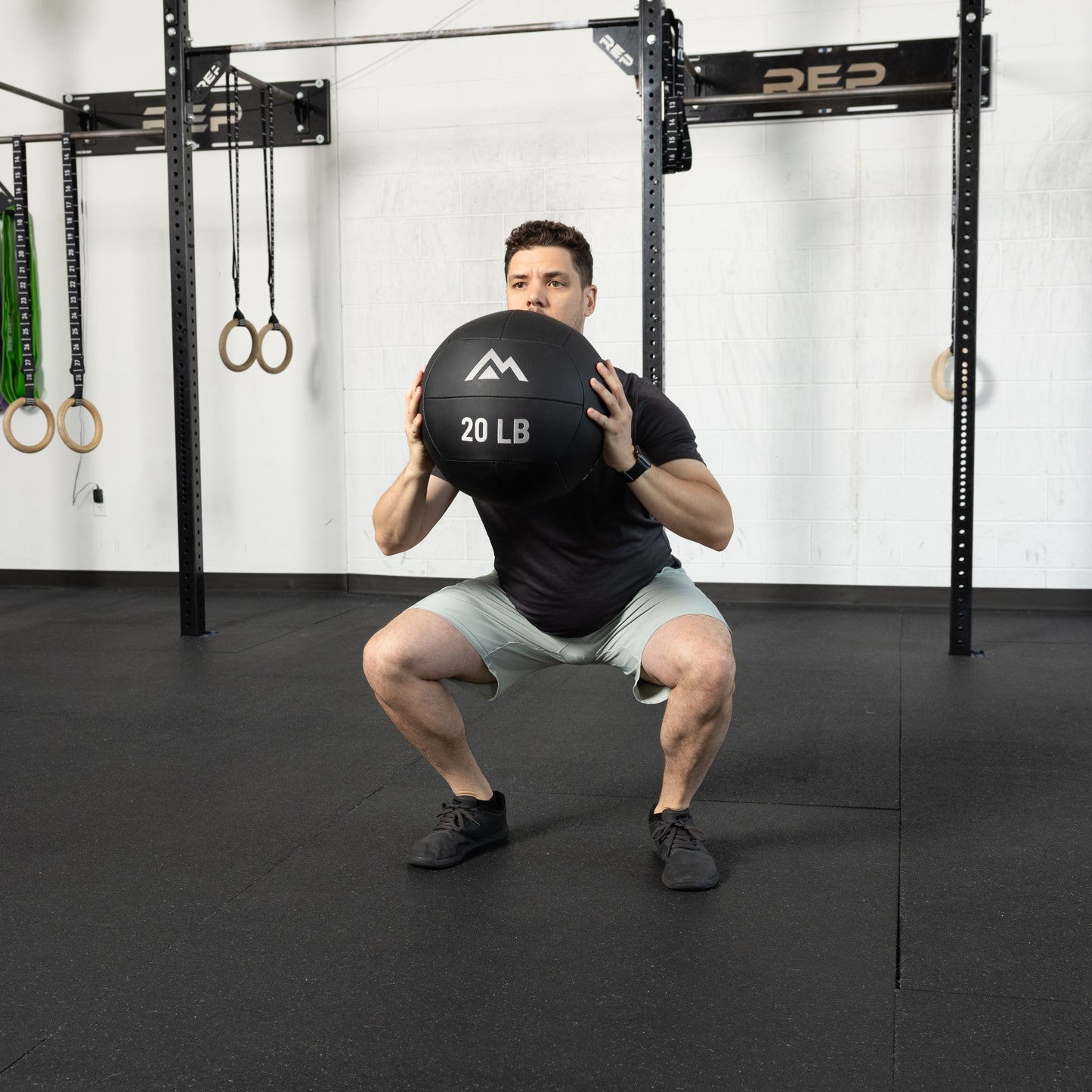 Athlete using the REP Fitness Medicine Balls 2.0