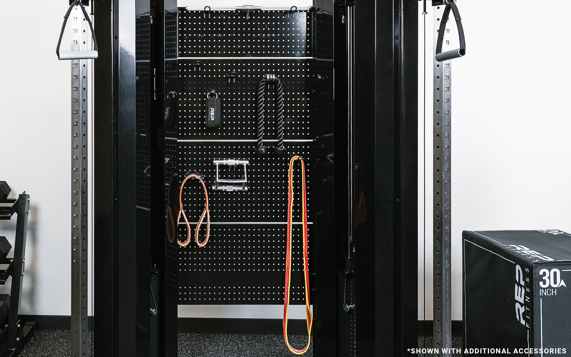 Image of multiple attachments hanging on the black pegboards of the black Arcadia™ max