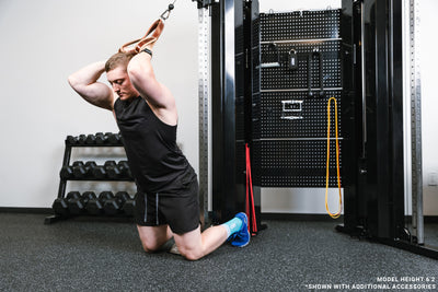 Image of someone doing a cable crunch on the black Arcadia™ max