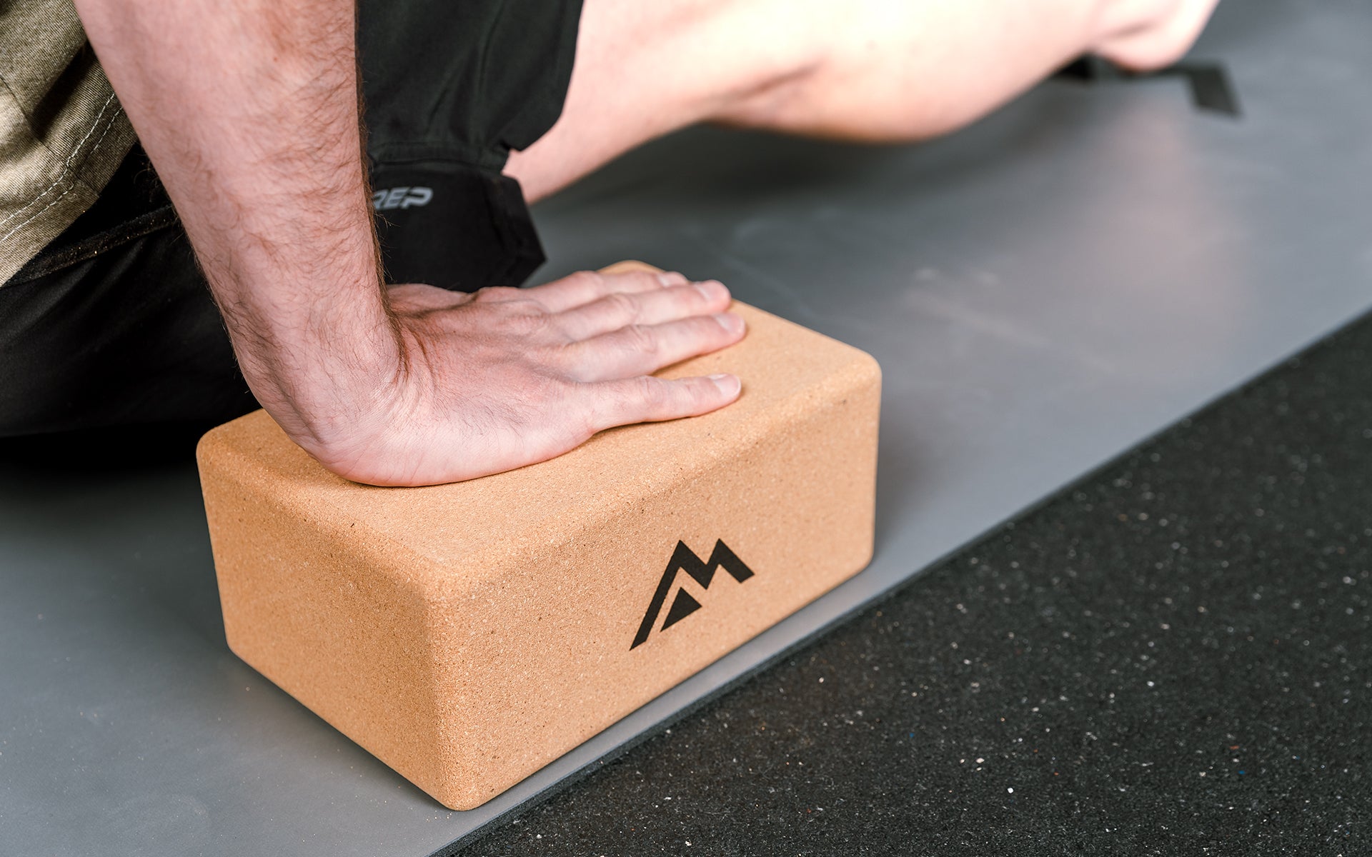 cork material up close with hands on blocks