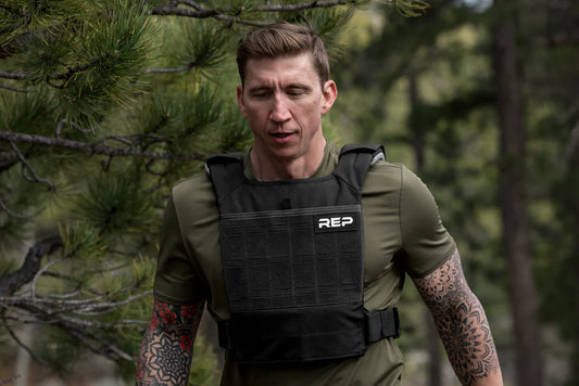 Conditioning - Person wearing and working out in the Strata™ Weight Vest in an outdoor setting.