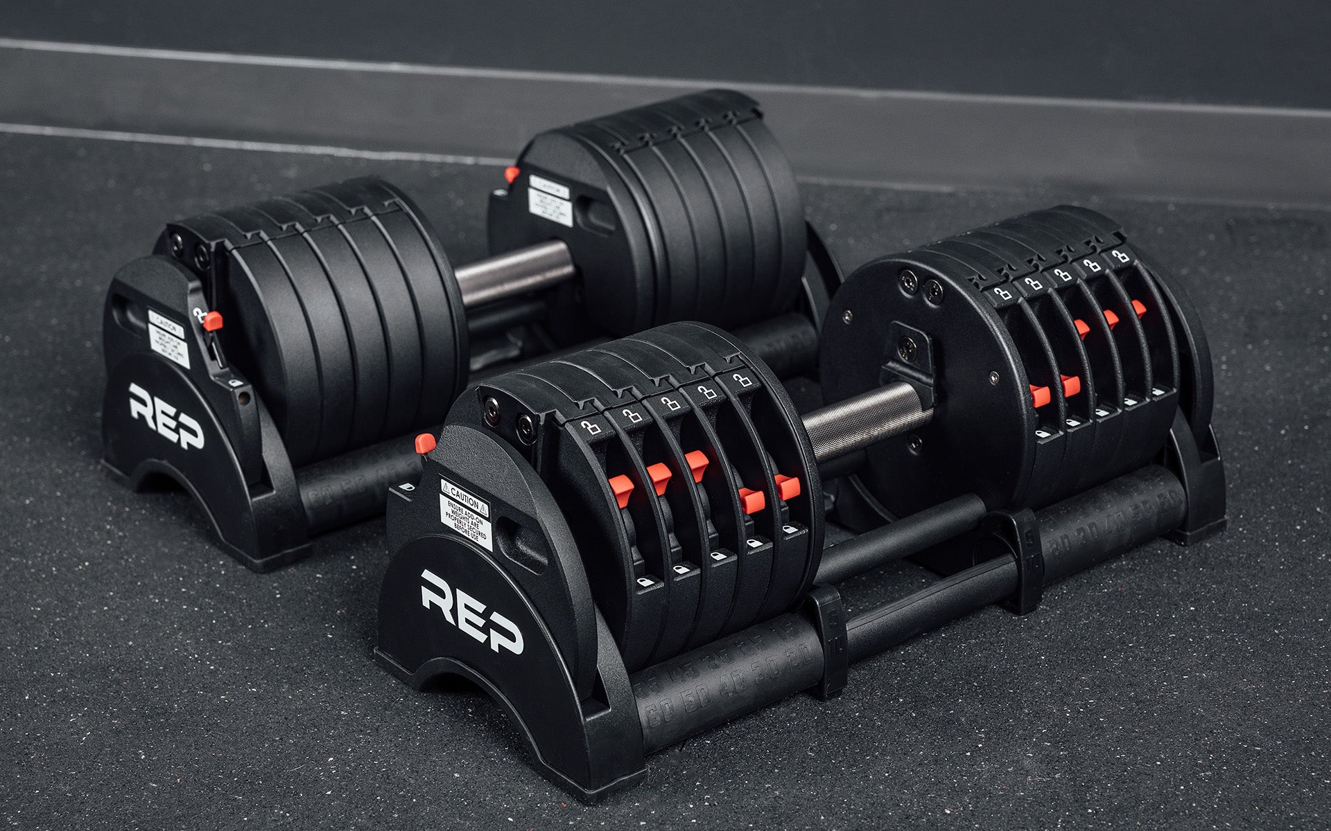 rep fitness quickdraw dumbbells inside of stands