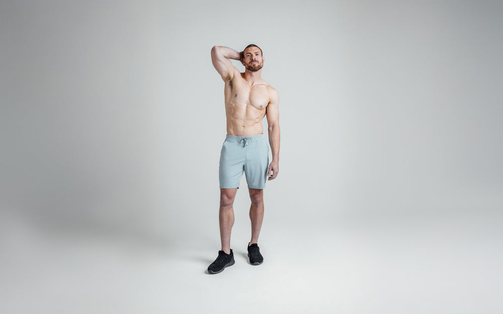 Athlete wearing dusty blue versa shorts
