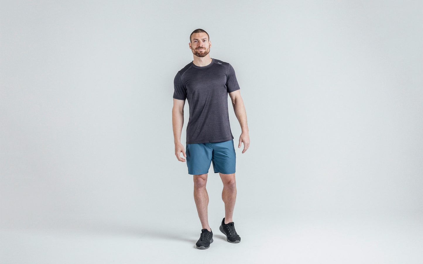 Athlete wearing Heather Black Sigmatech Shirt