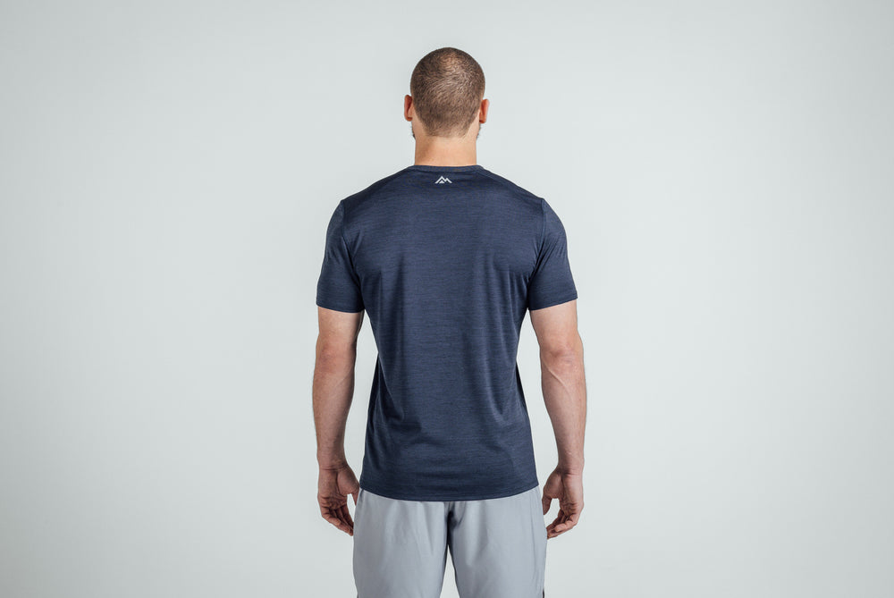 Back view of an athlete wearing Heather Navy Sigmatech Shirt