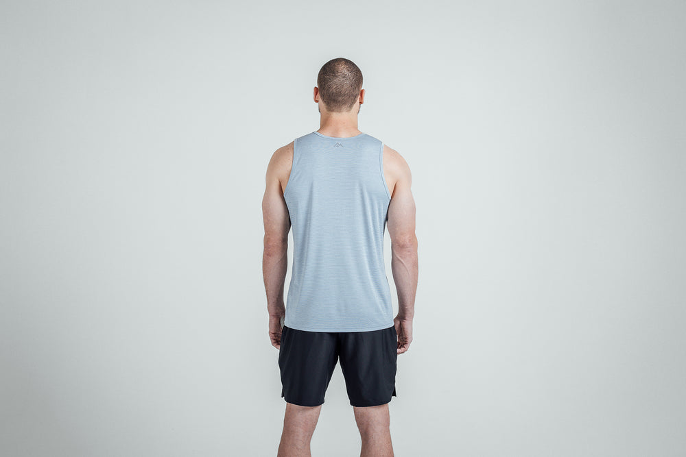 Back view: Athlete wearing Heather Dusty Sigmatech Tank Top