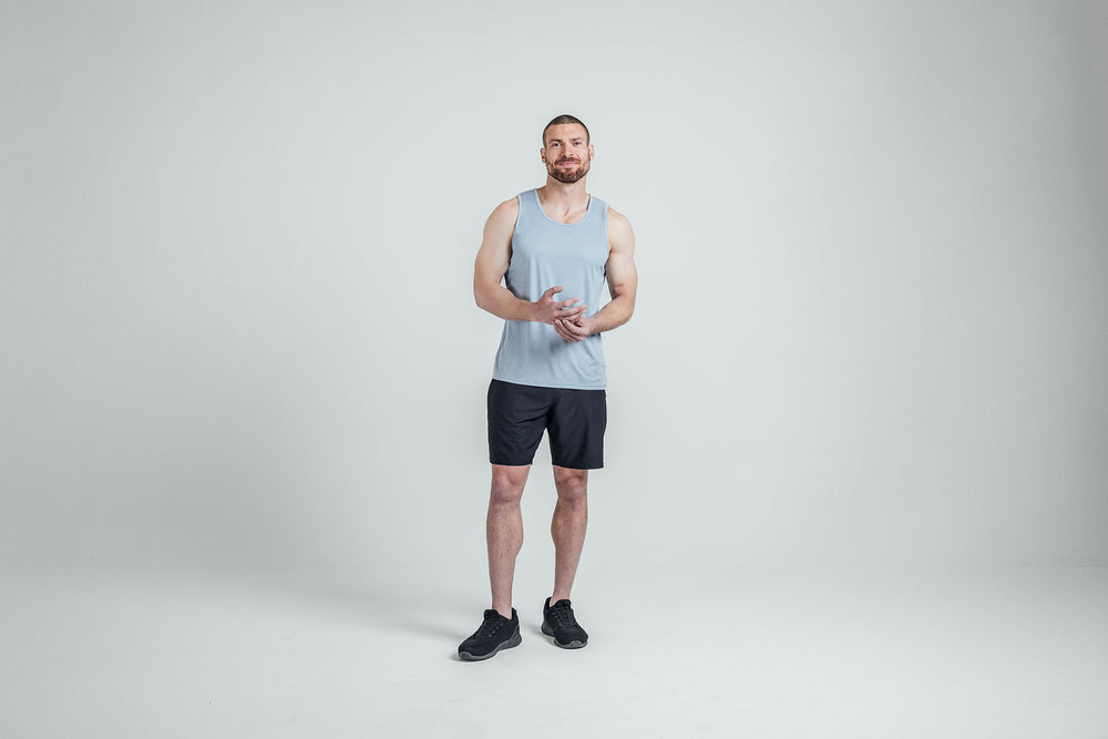 Athlete wearing Heather Dusty Sigmatech Tank Top