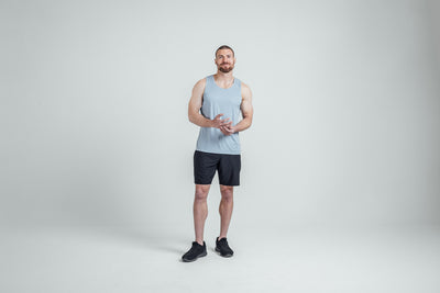 Athlete wearing Heather Dusty Sigmatech Tank Top
