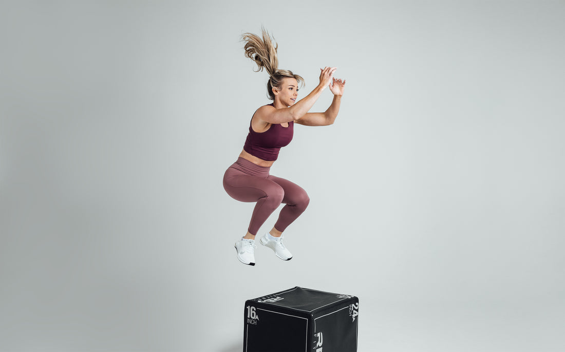 The REP Fitness Women's Rhea Cropped Tank Top in Wine front, box jump