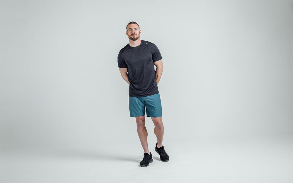 Athlete wearing slate Men's Motus Shorts