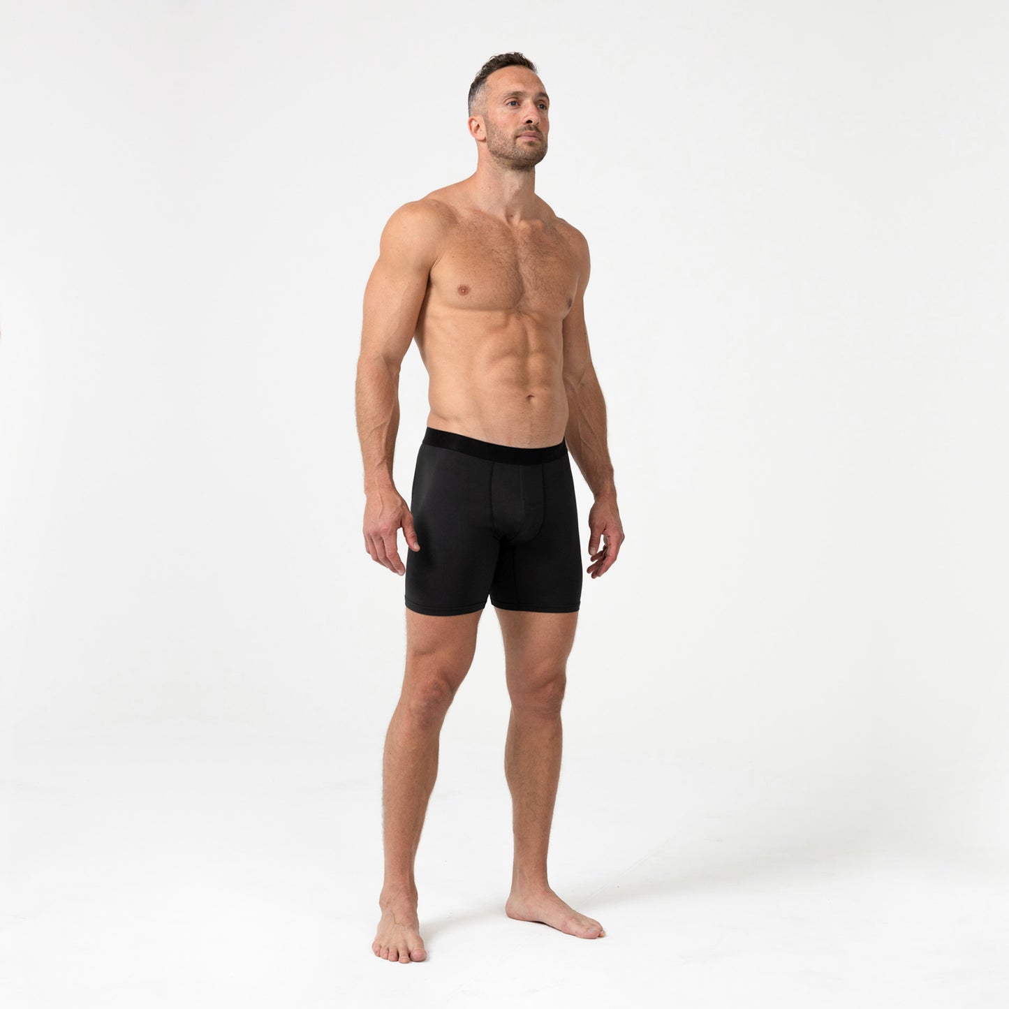 Full-body front photo of an athlete wearing REP Fitness Men's Foris Boxer Brief in Black