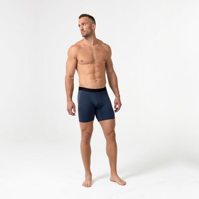 Full-body front photo of an athlete wearing REP Fitness Men's Foris Boxer Brief in Navy