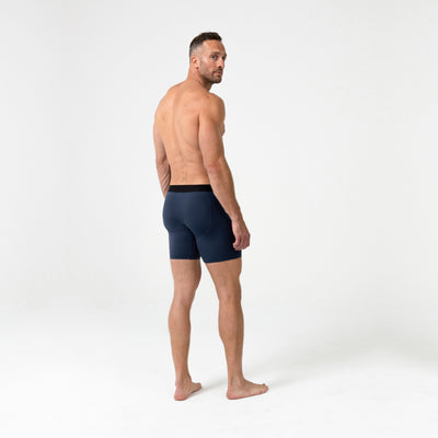 Full-body back photo of an athlete wearing REP Fitness Men's Foris Boxer Brief in Navy