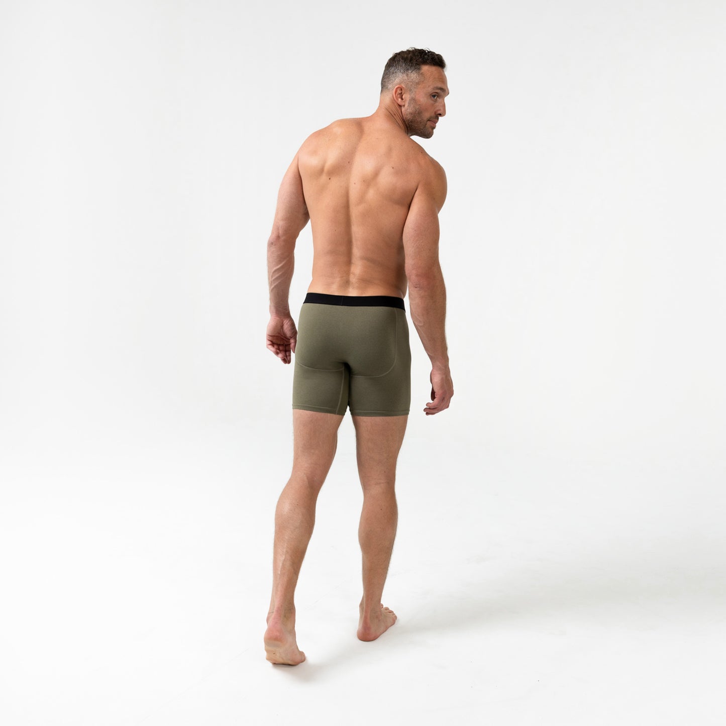 Full-body back photo of an athlete wearing REP Fitness Men's Foris Boxer Brief in Olive