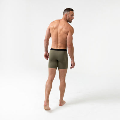 Full-body back photo of an athlete wearing REP Fitness Men's Foris Boxer Brief in Olive