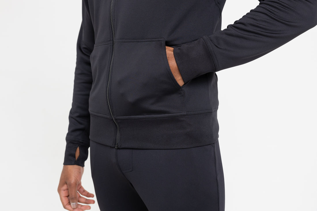 The REP Fitness Men's Attis Jacket in Heather Black front, front pocket detail