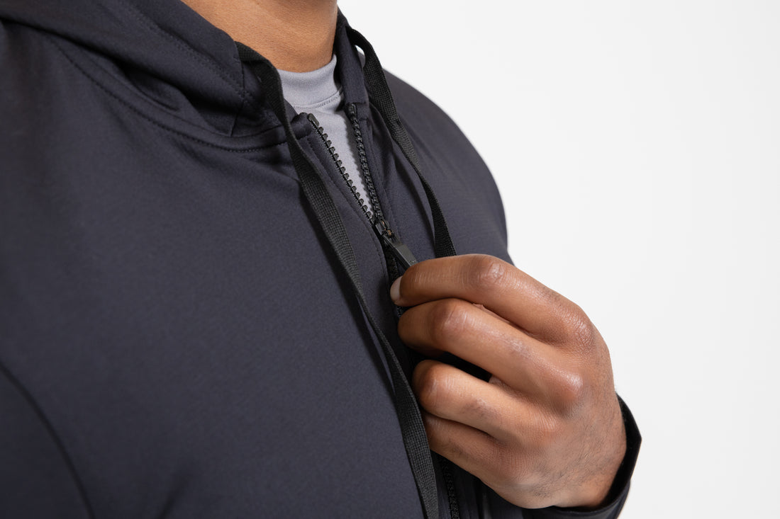 The REP Fitness Men's Attis Jacket in Heather Black front, zipper detail