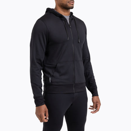 A man wearing the Attis Jacket in Heather Black