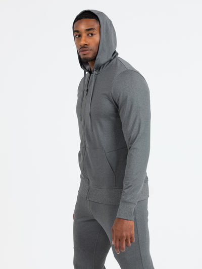 Person in heather cool gray Attis Jacket