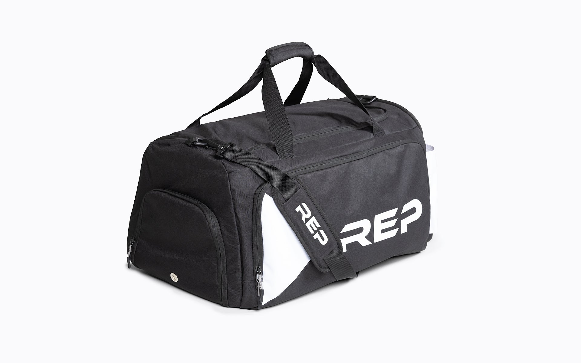 Angled view of black and white REP Gym Bag