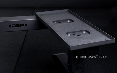 Matte black trays for QuickDraw™ adjustable dumbbells on the REP® Adjustable Dumbbell Stand