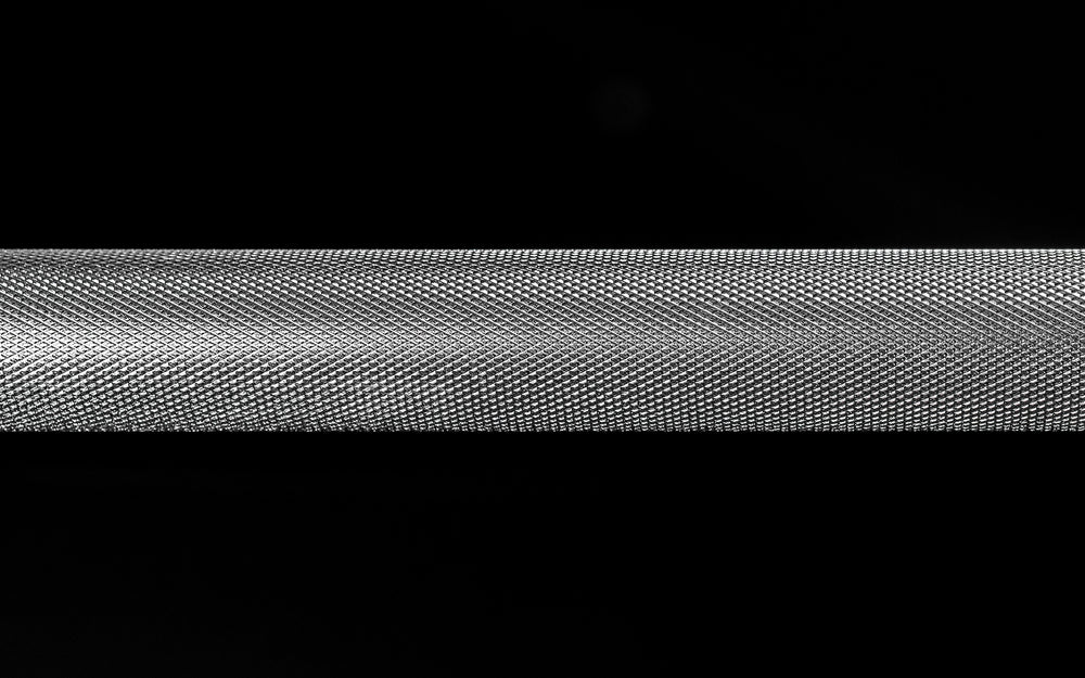 Close-up view of the Volcano knurling on the REP Delta Basic Bar.