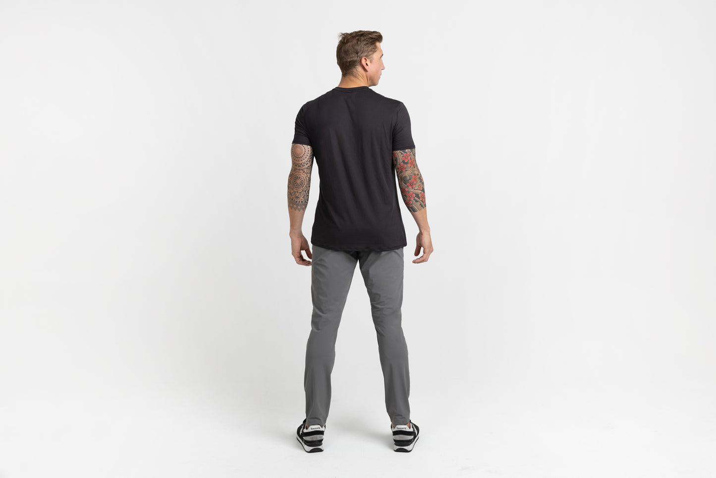 Rear shot of an athlete posing in 
Cool Gray Men's Felix Pants 2.0