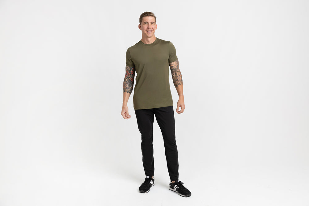 Front shot of an athlete posing in black Men's Felix Pants 2.0