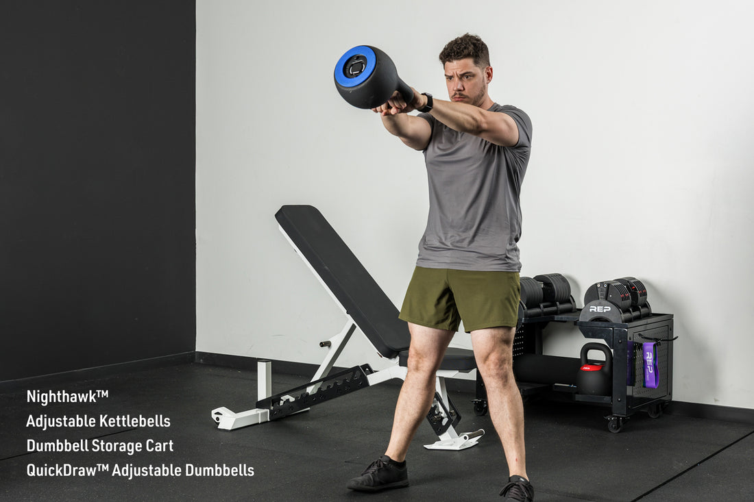 An athlete doing kettlebell swings with the adjustable Kettlebells