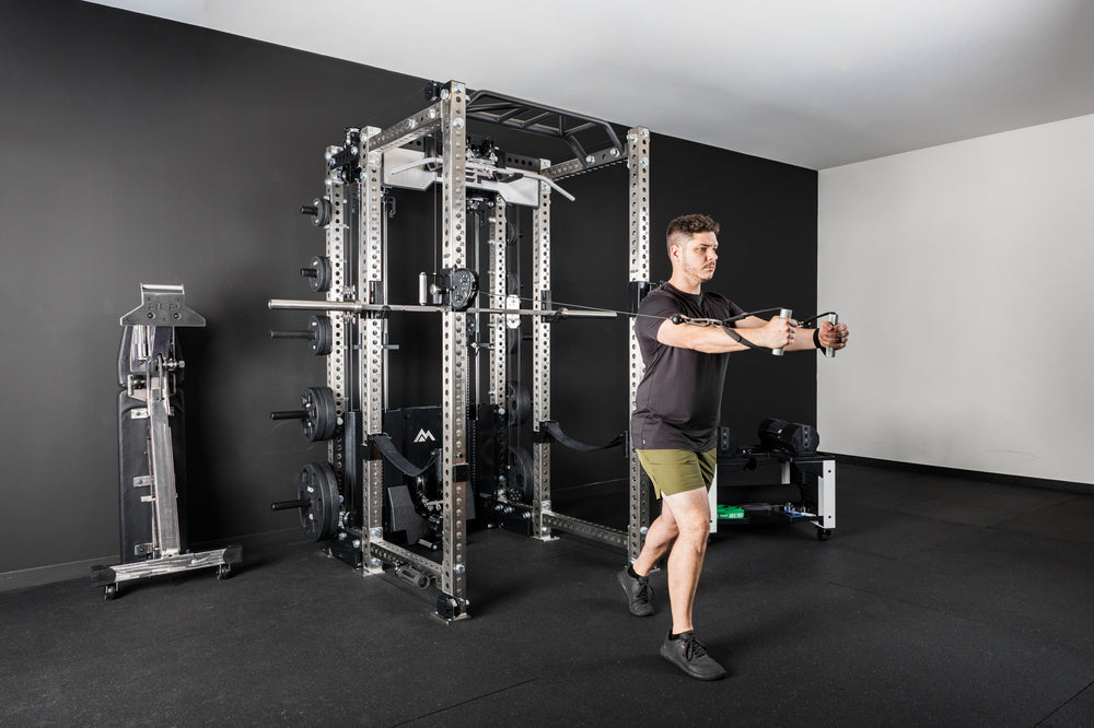 An athlete doing a cable fly exercise on the PR-5000 with an Ares 2.0