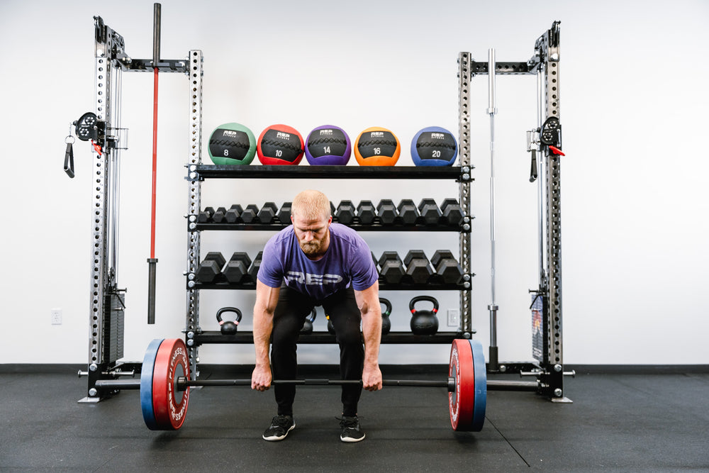 Dumbbell & Kettlebell Shelves being used for dumbbell , kettlebell, and medicine ball storage in the Functional Trainer with storage configuration