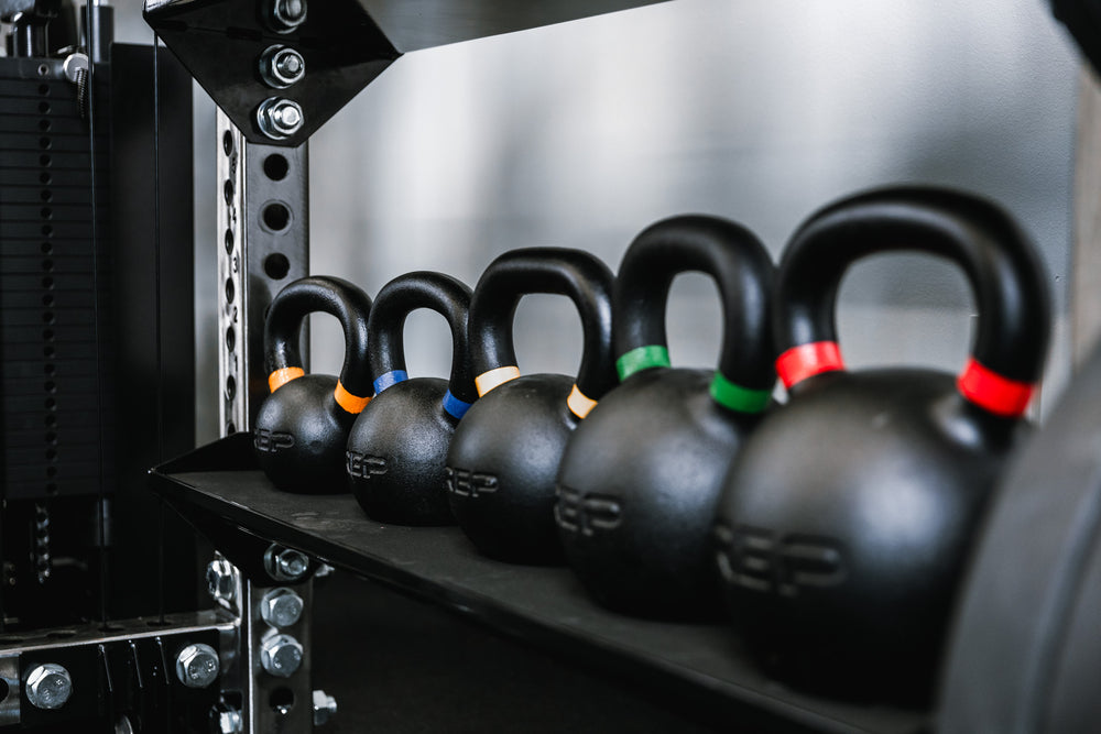 Off-Rack Storage - close up of flat storage shelf holding kettlebells