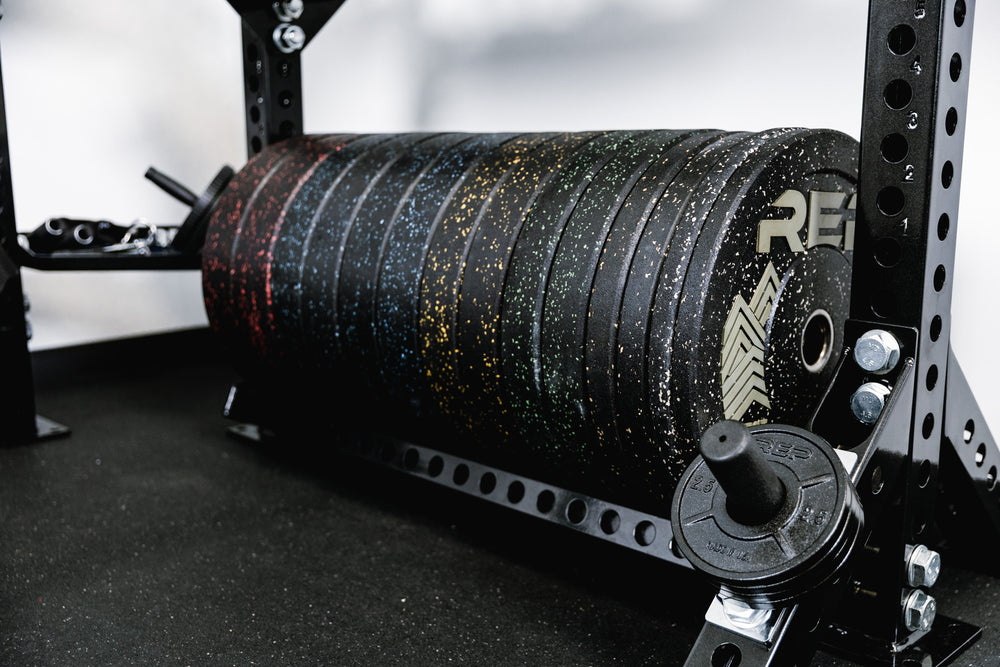 Stand-Alone Modular Storage System - Close up of Ball & Plate Storage Shelf holding REP bumper plates