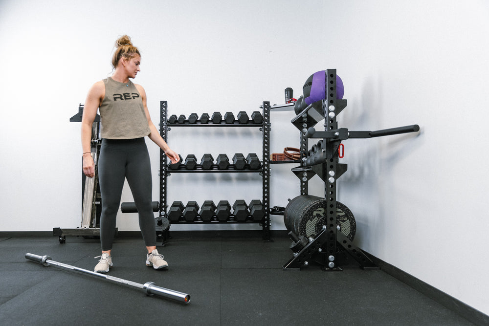 Stand-Alone Modular Storage System. Corner Shelf Unit holding dumbbells, slam balls, medicine balls, kettlebells, bumper plates, attachments, and small accessories