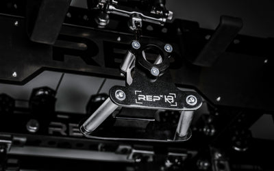 REP® x Kleva Built® Angled Atlas™ Close-Grip Cable and Landmine Attachment on the lat pulldown cable on an Ares™ 2.0