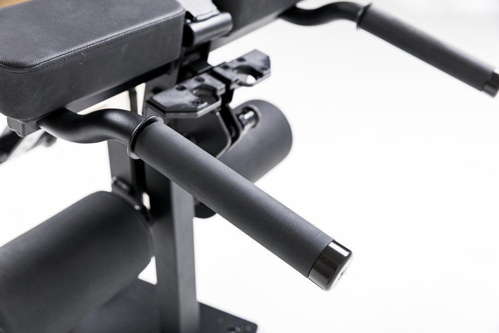Close-up shot of the handles on the Leg Extension & Leg Curl Bench Attachment