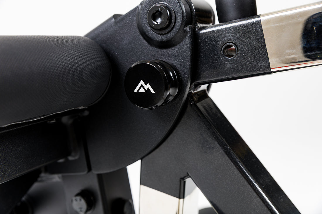 Close-up shot of the storage pin on the Leg Extension & Leg Curl Bench Attachment