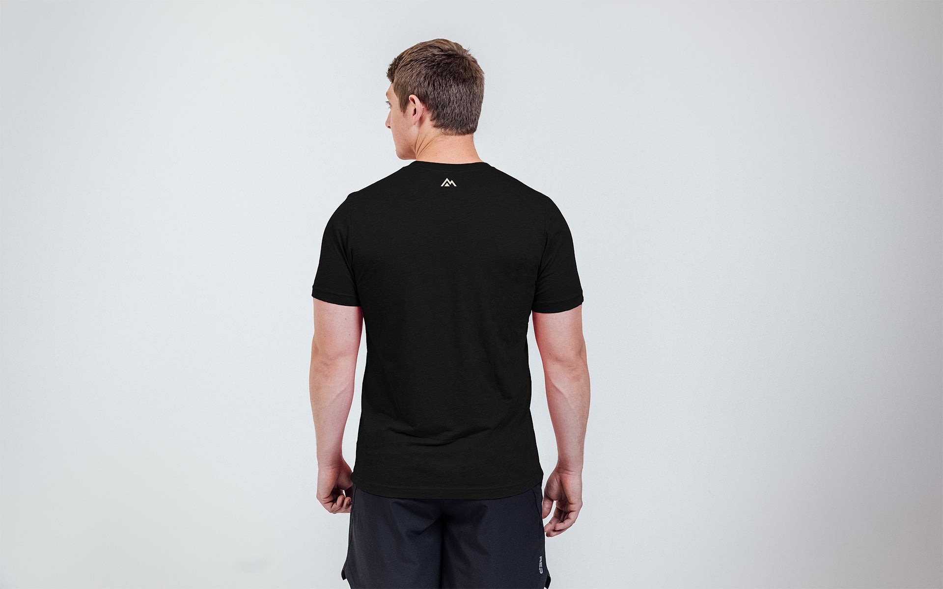 Back of the Heather Black Daily Driver 2.0 USA Tee