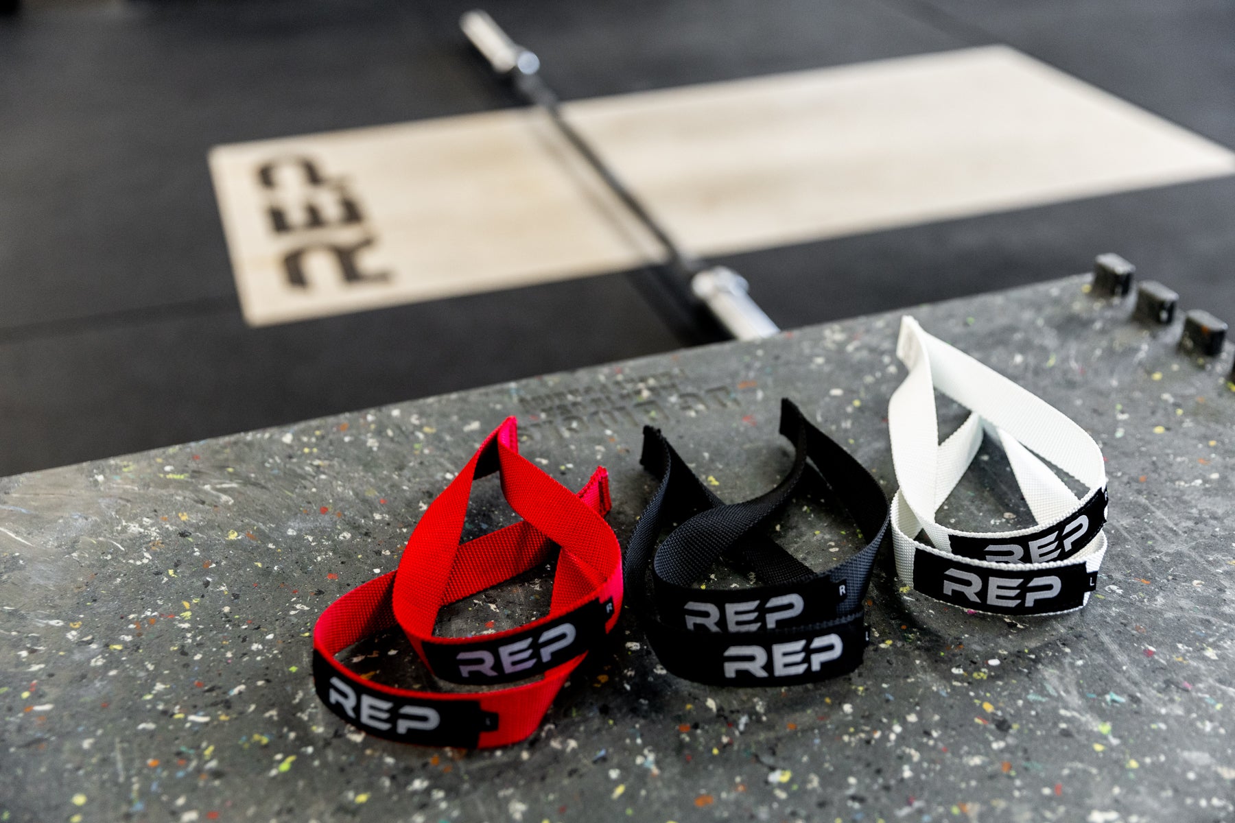 Red, black, and white REP Olympic Lifting Straps