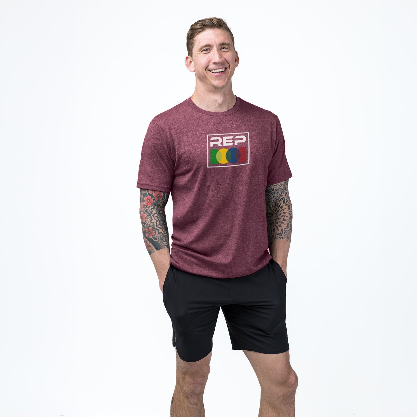 Athlete wearing the REP fitness Stacked Tri-Blend Crew T-Shirt in Heather Maroon/White