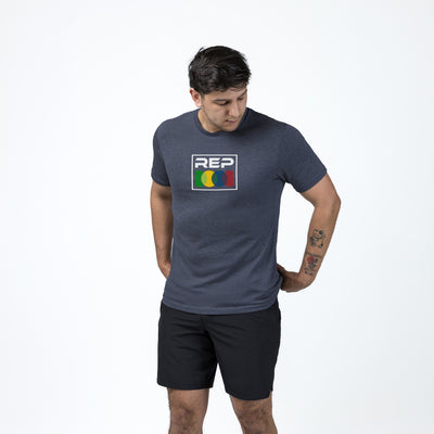 Athlete wearing the REP fitness Stacked Tri-Blend Crew T-Shirt in Heather Navy/White