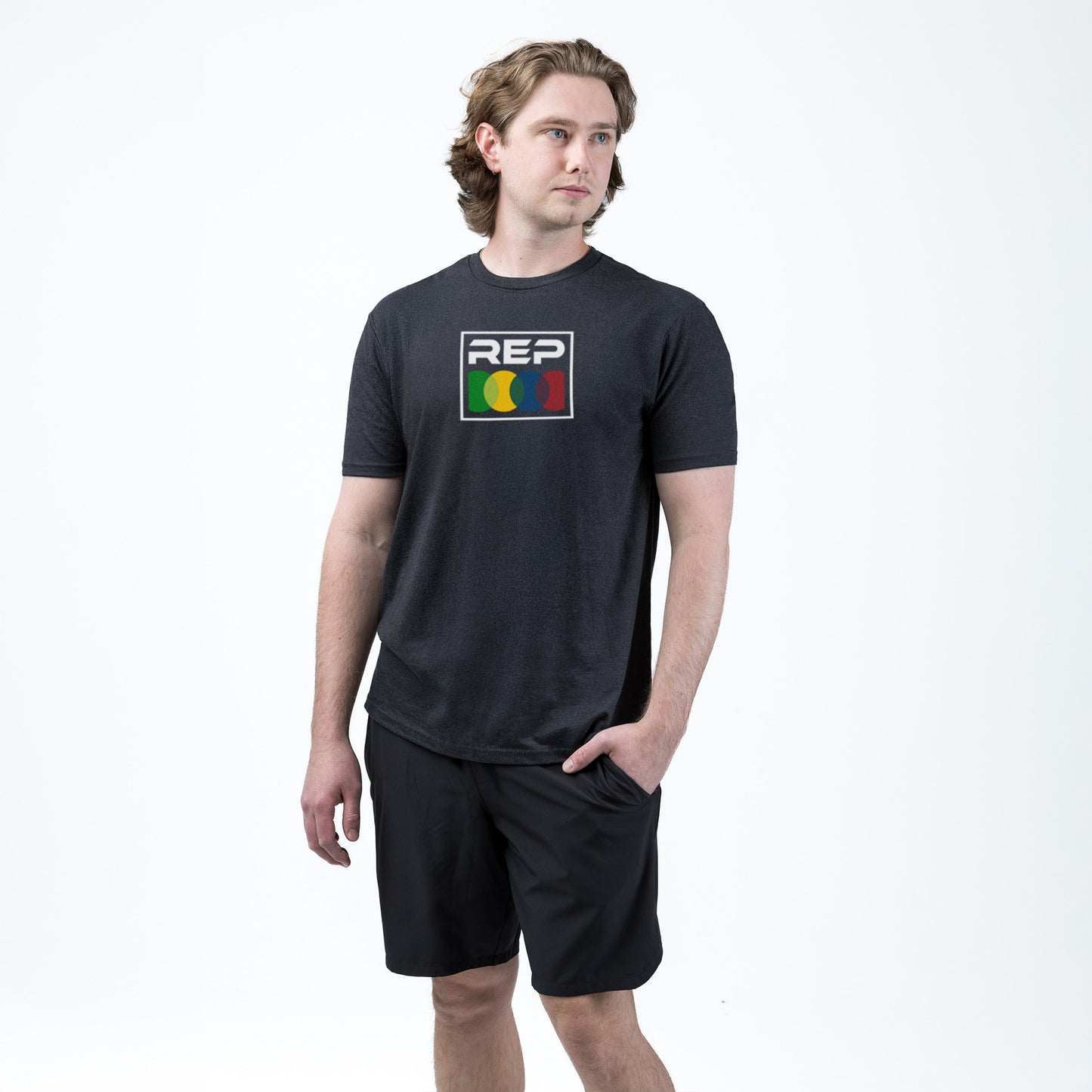 Athelete wearing the REP fitness Stacked Tri-Blend Crew T-Shirt in Heather Black/White